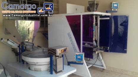 Empacotadora e pesadora JHM Empacotadora e pesadora JHM